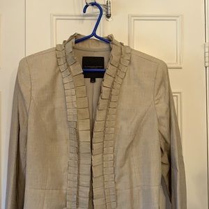 Tan blazer with slight shimmer.